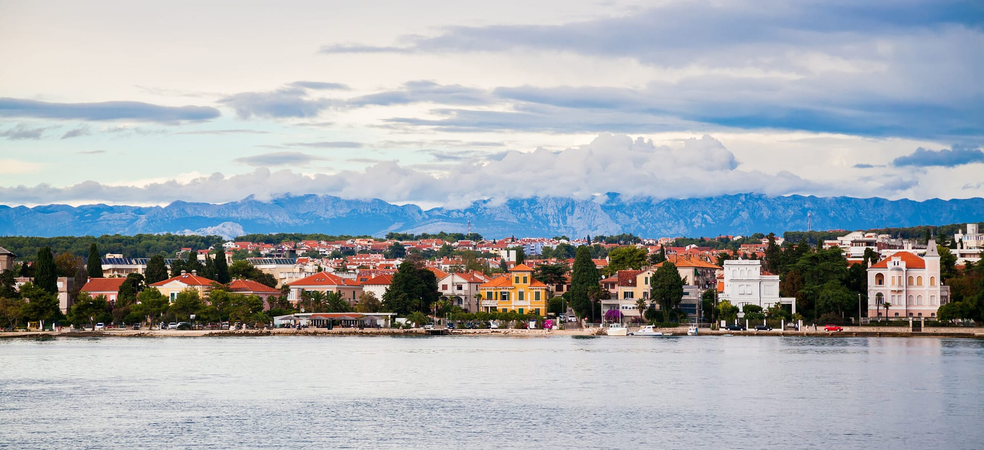 Zadar waterfront view with mountains Velebit in a distance, Croatia